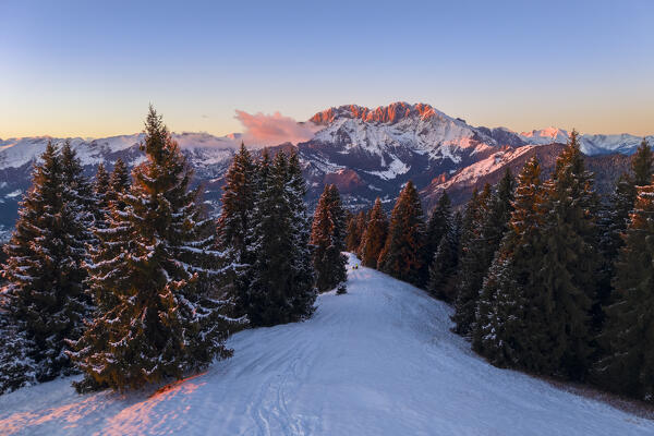 View of the Presolana during a winter sunset from Monte Pora, Val Seriana, Bergamo district, Lombardy, Italy.
