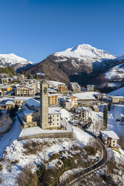 Aerial view of Zambla at sunrise after a snowfall in winter. Val Serina, Zambla Alta, Bergamo district, Lombardy, Italy, Southern Europe.