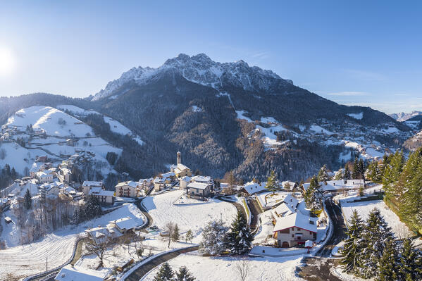 Aerial view of Zambla at sunrise after a snowfall in winter. Val Serina, Zambla Alta, Bergamo district, Lombardy, Italy, Southern Europe.