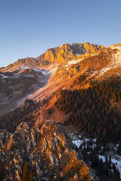 Aerial panorama of the Presolana mountain from Colle Presolana ins winter at sunset. Val Seriana, Castione della Presolana, Bergamo district, Lombardy, Italy, Southern Europe.