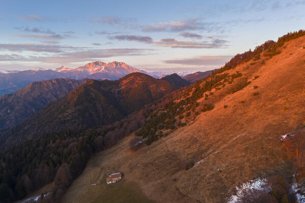 Aerial view of a winter sunset from the top of Monte Colombina looking towards Val Seriana and Presolana. Bossico, Lombardy district, Bergamo province, Italy, Europe.