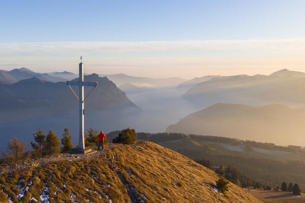 Aerial view of a winter sunset from the top of Monte Colombina looking towards Lake Iseo. Bossico, Lombardy district, Bergamo province, Italy, Europe.