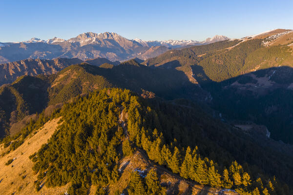 Aerial view of a winter sunset from the top of Monte Colombina looking towards Val Seriana and Presolana. Bossico, Lombardy district, Bergamo province, Italy, Europe.