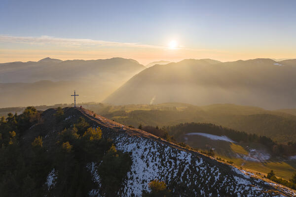 Aerial view of a winter sunset from the top of Monte Colombina looking towards Lake Iseo. Bossico, Lombardy district, Bergamo province, Italy, Europe.