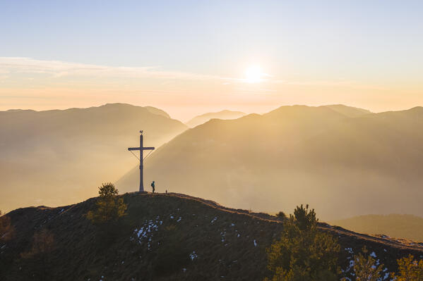 Aerial view of a winter sunset from the top of Monte Colombina looking towards Lake Iseo. Bossico, Lombardy district, Bergamo province, Italy, Europe.