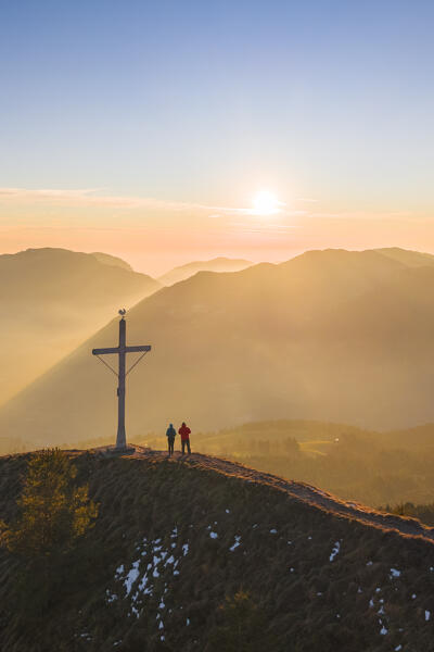 Aerial view of a winter sunset from the top of Monte Colombina looking towards Lake Iseo. Bossico, Lombardy district, Bergamo province, Italy, Europe.