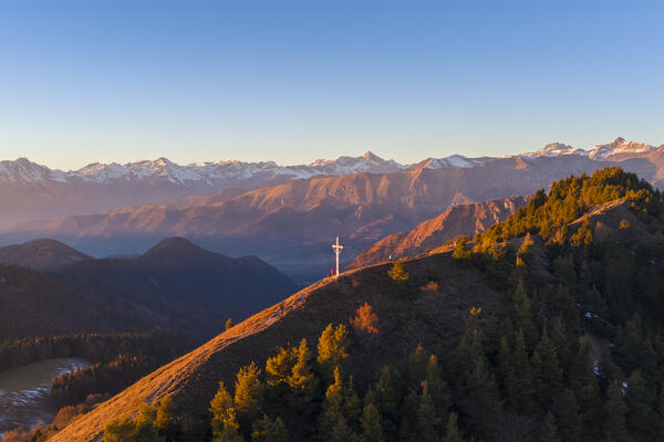 Aerial view of a winter sunset from the top of Monte Colombina looking towards Orobie prealps. Bossico, Lombardy district, Bergamo province, Italy, Europe.