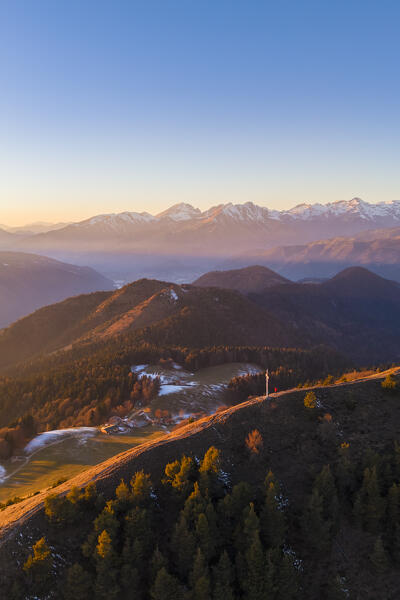 Aerial view of a winter sunset from the top of Monte Colombina looking towards Orobie prealps. Bossico, Lombardy district, Bergamo province, Italy, Europe.