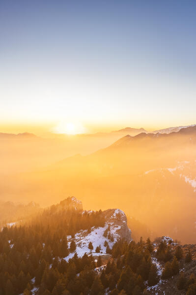 Aerial panorama of the Presolana mountain from Colle Presolana ins winter at sunset. Val Seriana, Castione della Presolana, Bergamo district, Lombardy, Italy, Southern Europe.
