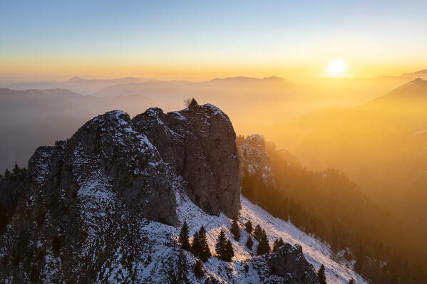 Aerial panorama of the Presolana mountain from Colle Presolana ins winter at sunset. Val Seriana, Castione della Presolana, Bergamo district, Lombardy, Italy, Southern Europe.