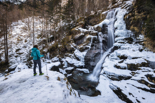 View of the Sèrsen waterfall in winter. Valle Sanguigno, Valgoglio, Val Seriana, Bergamo district, Lombardy, Italy, Southern Europe.