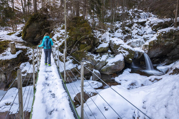 View of the Sèrsen waterfall in winter. Valle Sanguigno, Valgoglio, Val Seriana, Bergamo district, Lombardy, Italy, Southern Europe.