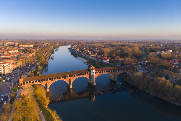 Aerial view of the Ponte Coperto in Pavia at sunset in winter. Pavia, Pavia province, Lombardy, Italy, Europe.