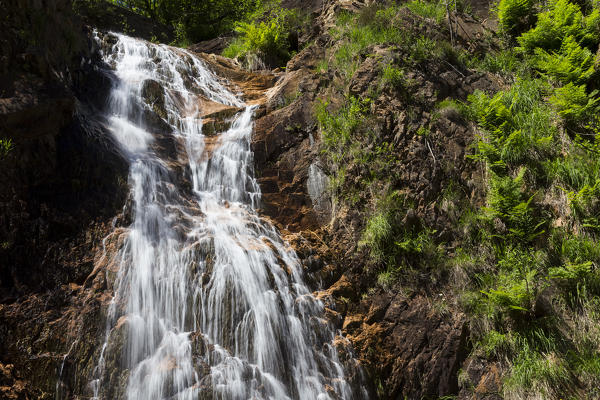 The red waterfall of Valvassera, Induno Olona, Varese Province, Lombardy, Italy.