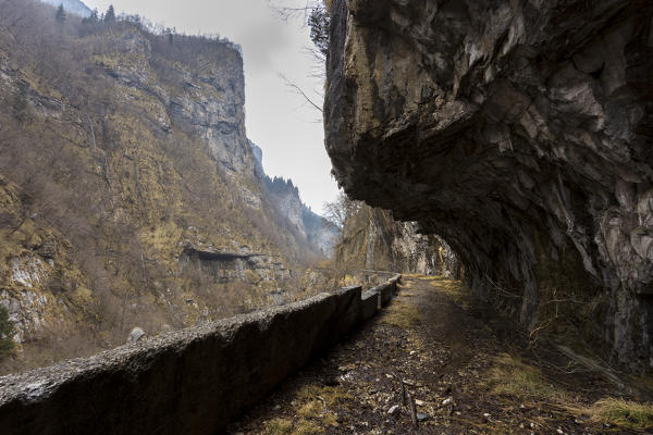 The old road of Via Mala di Scalve, Dezzo di Scalve, Val di Scalve, Bergamo province, Lombardy, Italy.