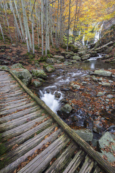 Wooden bridge at the Dardagna waterfalls, Corno Alle Scale Regional Park, Lizzano in Belvedere, Emilia Romagna, Italy.