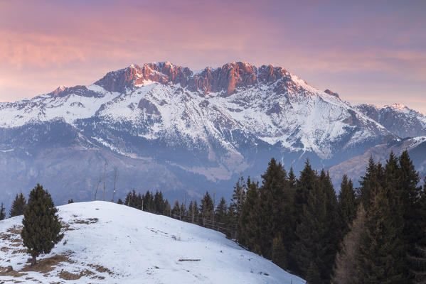 View of the Presolana during a winter sunrise from Monte Pora, Val Seriana, Bergamo district, Lombardy, Italy.