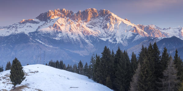View of the Presolana during a winter sunrise from Monte Pora, Val Seriana, Bergamo district, Lombardy, Italy.