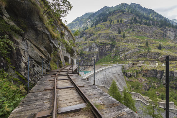 The rails towards the dam of Lago Campliccioli, Valle Antrona, Piedmont, Italy.