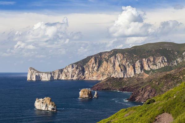 View of the coast near Masua, in the distance the Pan di Zucchero reef. Masua, Sulcis-iglesiente, Iglesias, Sardinia, Italy.