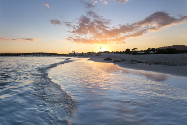 Colorful clouds during a sunset at Porto Giunco beach, Villasimius, Cagliari, Sardinia, Italy, Europe.