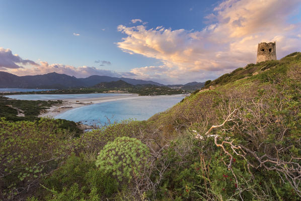 View of the beach of Porto Giunco and the Notteri pond at sunset from the old tower of Capo Carbonara, Villasimius, Cagliari, Sardinia, Italy, Europe.