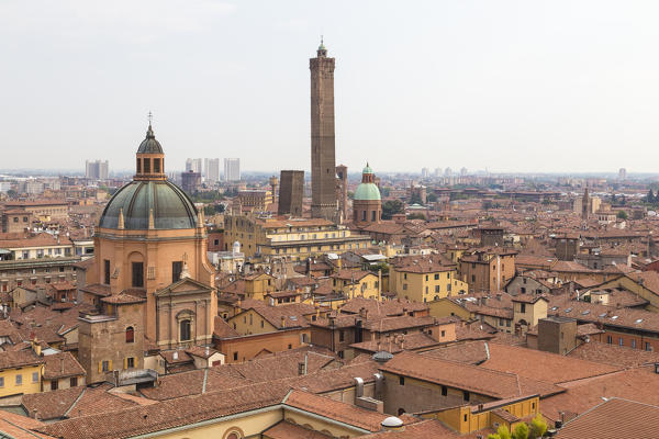View of the church of San Bartolomeo e Gaetano, the Torre degli Asinelli and Torre della Garisenda from the rooftop of  the San Petronio basilica, Bologna, Emilia Romagna, Italy.