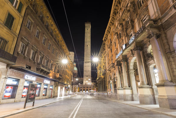 View of the Torre degli Asinelli from via Rizzoli at night. Bologna, Emilia Romagna, Italy.