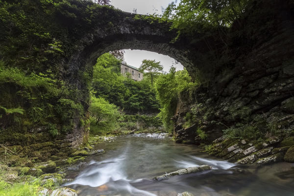 Bridge over the river Breggia at the Bruzella mill, Muggio Valley, Mendrisio District, Canton Ticino, Switzerland.