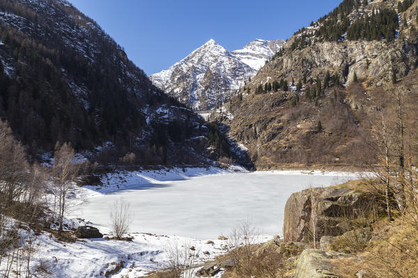 The iced Lago di Antrona in spring, Antrona Valley, Piedmont, Italy.