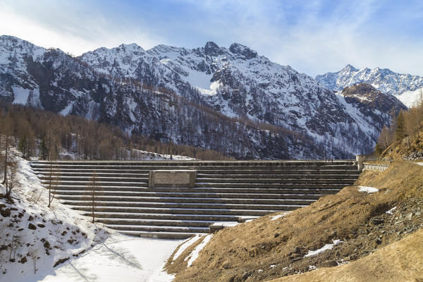 View of the dam of Lago Dei Cavalli and Pizzo d'Andolla. Alpe Cheggio, Antrona Valley, Piedmont, Italy.