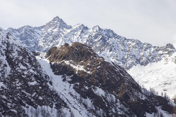 View of Pizzo d'Andolla from the dam of Lago Dei Cavalli. Alpe Cheggio, Antrona Valley, Piedmont, Italy.