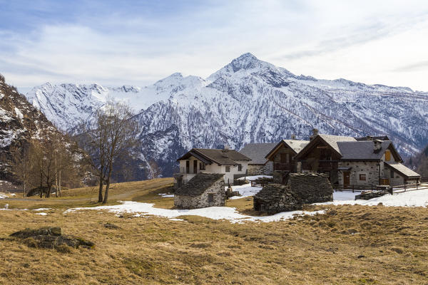 View of the town of Cheggio and the mountains of  Antrona valley from Alpe Cheggio, Antrona valley, Piedmont, Italy.