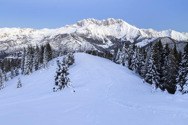 View of the Presolana during a winter sunrise from Monte Pora, Val Seriana, Bergamo district, Lombardy, Italy.