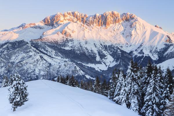 View of the Presolana during a winter sunrise from Monte Pora, Val Seriana, Bergamo district, Lombardy, Italy.
