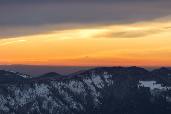 View of Monviso during a winter sunset from Monte Pora, Val Seriana, Bergamo district, Lombardy, Italy.