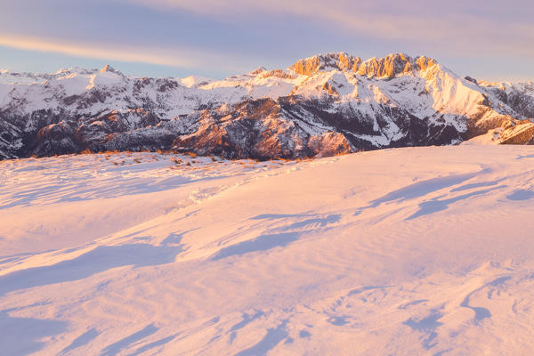 View of the Presolana during a winter sunset from Monte Pora, Val Seriana, Bergamo district, Lombardy, Italy.