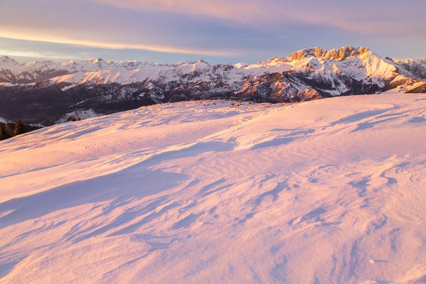 View of the Presolana during a winter sunset from Monte Pora, Val Seriana, Bergamo district, Lombardy, Italy.