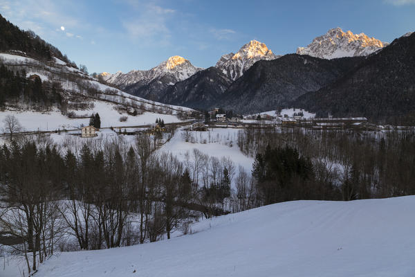 View of Pizzo Camino, Cima Moren and Cima Ezendola during a winter sunset. Schilpario, Val di Scalve, Bergamo district, Lombardy, Italy.