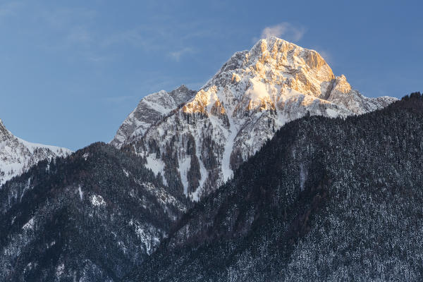View of Monte Susino from Schilpario during a winter sunset. Schilpario, Val di Scalve, Bergamo district, Lombardy, Italy.