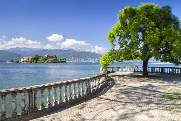 View of the Borromean Islands, Isola dei Pescatori and Isola Bella from a balcony on the lake front of Stresa in a spring day. Verbano Cusio Ossola, Lago Maggiore, Piedmont, Italy.