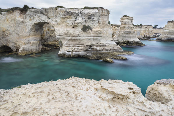 The Faraglioni of Torre Sant'Andrea. Melendugno, province of Lecce, Salento, Apulia, Italy.