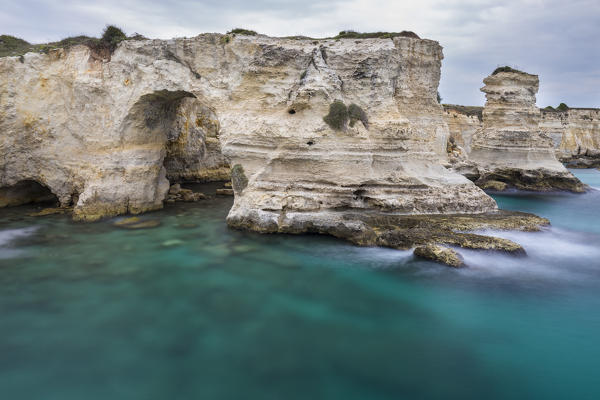 The Faraglioni of Torre Sant'Andrea. Melendugno, province of Lecce, Salento, Apulia, Italy.