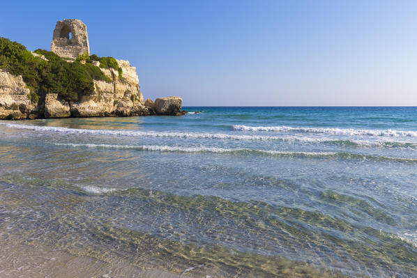 The old sighting tower of Torre dell'Orso in front of the homonym beach. Melendugno, province of Lecce, Salento, Apulia, Italy.