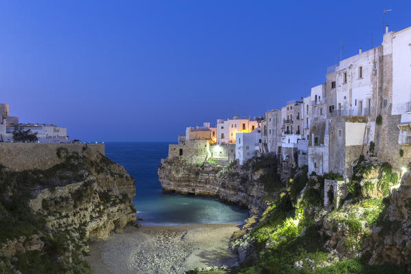 Night view of the cove Lama Monachile Cala Porto of Polignano a Mare. Bari district, Apulia, Italy, Europe.
