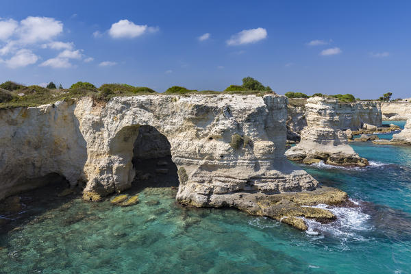 The faraglioni of Torre Sant'Andrea. Melendugno, province of Lecce, Salento, Apulia, Italy.