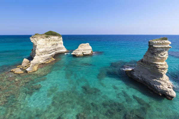 The Faraglioni of Torre Sant'Andrea. Melendugno, province of Lecce, Salento, Apulia, Italy.