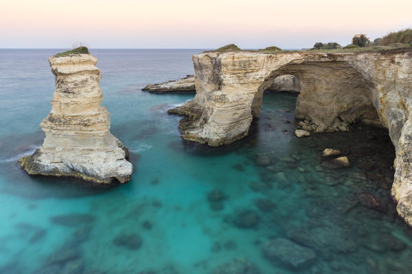 The Faraglioni of Torre Sant'Andrea. Melendugno, province of Lecce, Salento, Apulia, Italy.