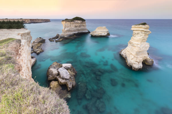 The Faraglioni of Torre Sant'Andrea. Melendugno, province of Lecce, Salento, Apulia, Italy.