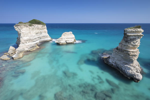 The Faraglioni of Torre Sant'Andrea. Melendugno, province of Lecce, Salento, Apulia, Italy.